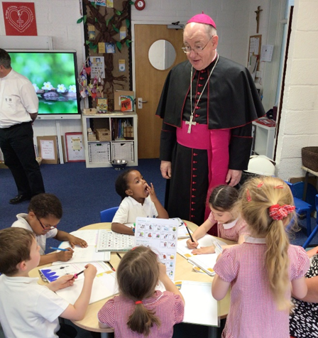 Bishop talking to students