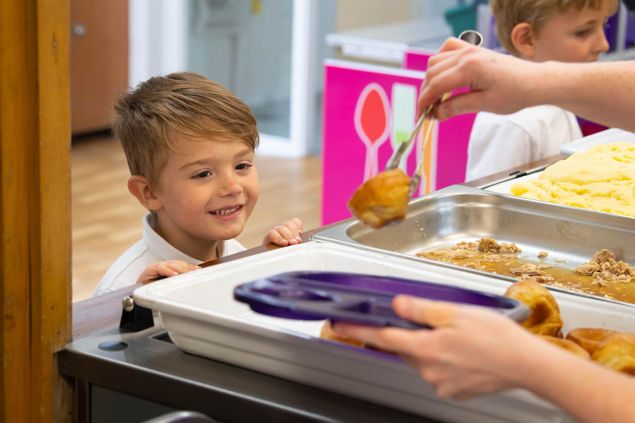 Child being served lunch